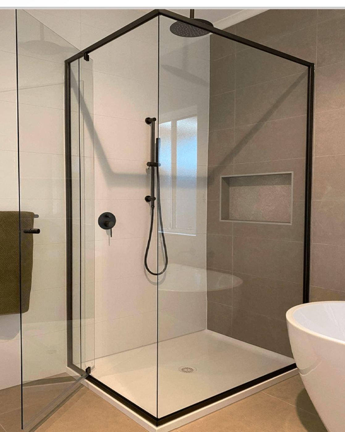 Black semi-frameless corner shower