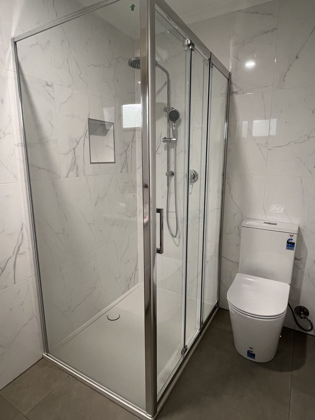 Semi-frameless sliding shower screen with three front panels