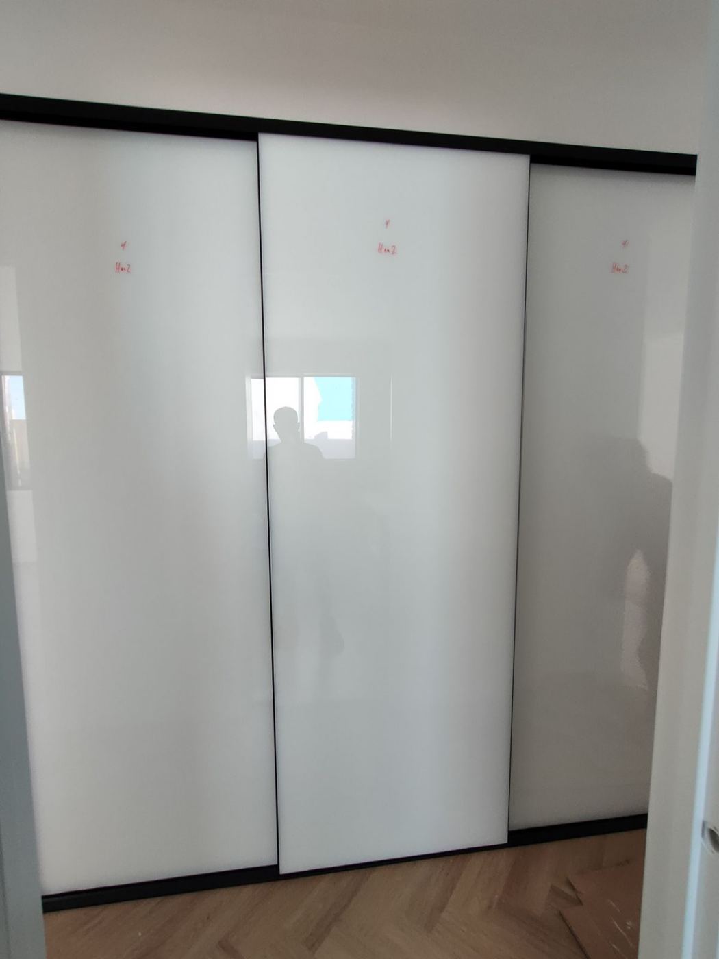 White glass sliding wardrobe doors
